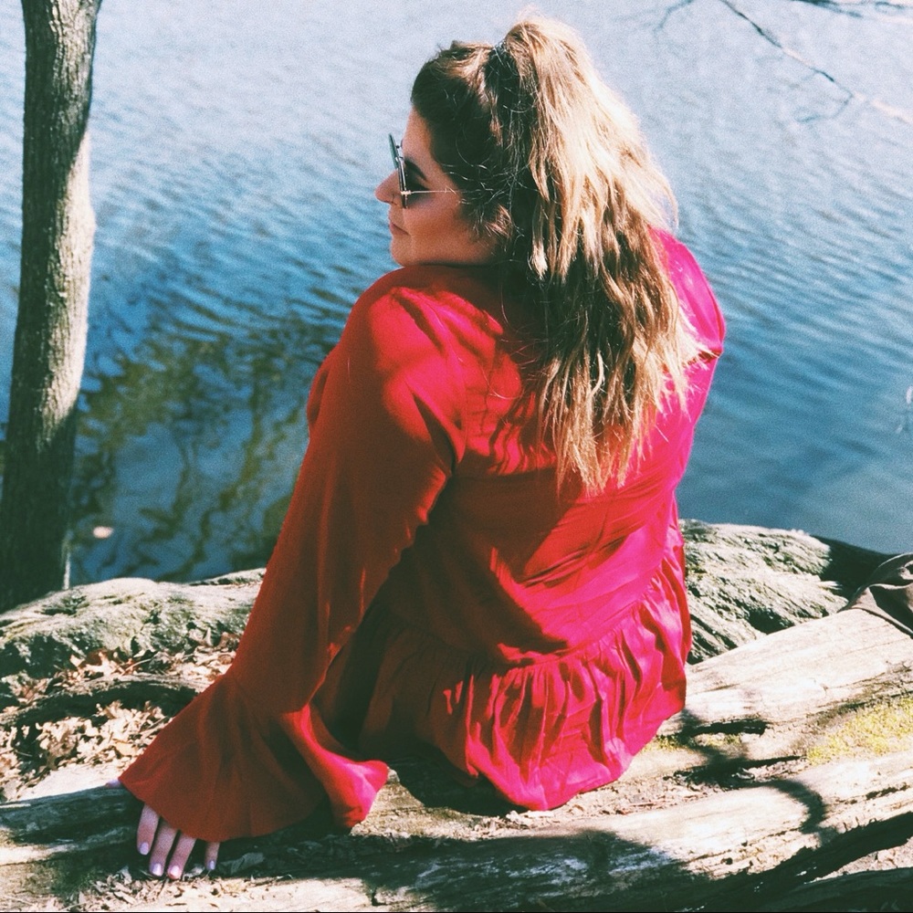Red peplum top with bell sleeves